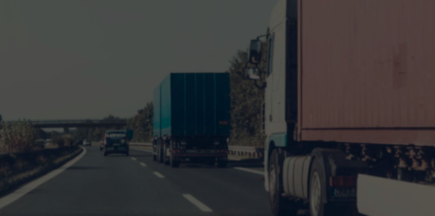 semi trucks driving on the highway